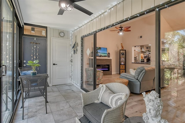 living room featuring ceiling fan