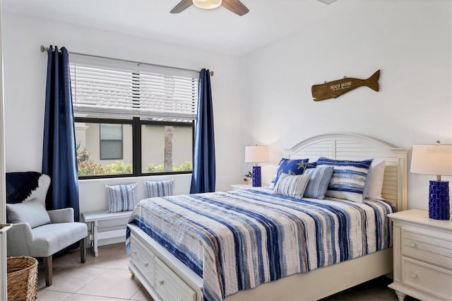 bedroom featuring multiple windows, light tile patterned floors, and ceiling fan