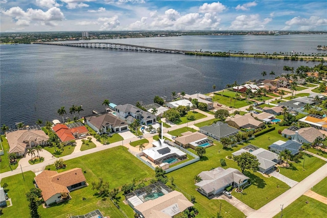 birds eye view of property featuring a water view