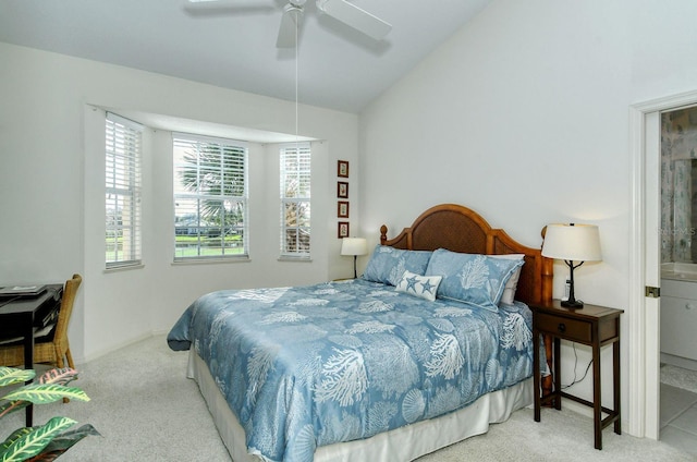 bedroom with light colored carpet, ceiling fan, and lofted ceiling