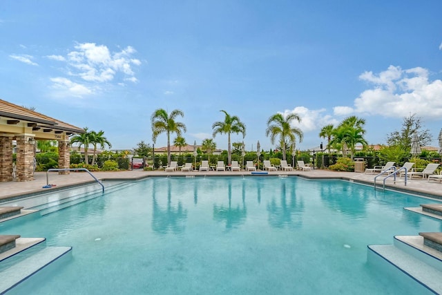 view of swimming pool featuring a patio