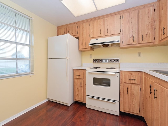 kitchen featuring light brown cabinetry, white appliances, and dark hardwood / wood-style floors