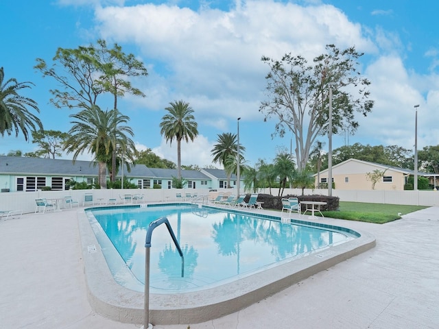 view of pool featuring a patio