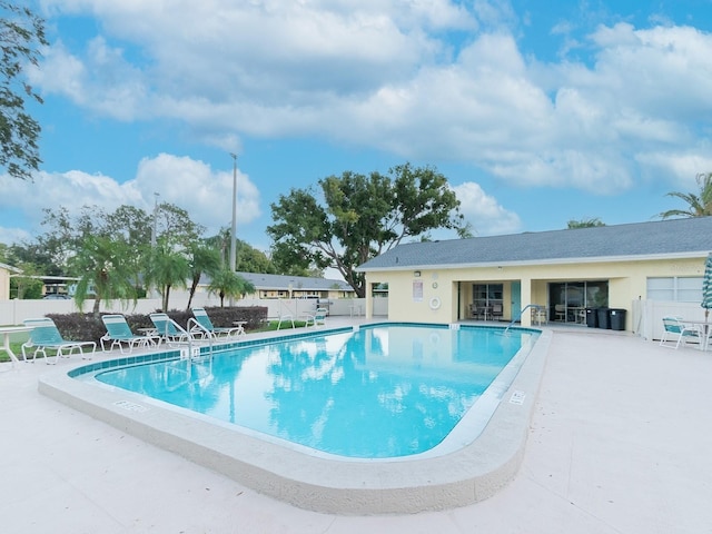 view of swimming pool featuring a patio