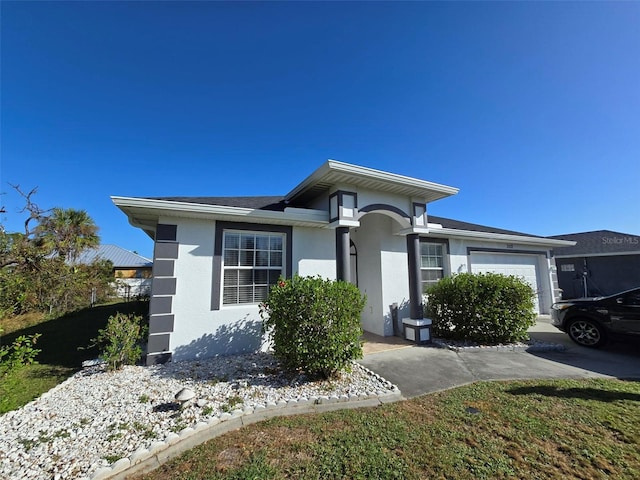 view of front of property with a garage