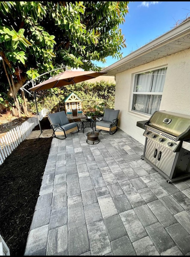 view of patio / terrace featuring a grill