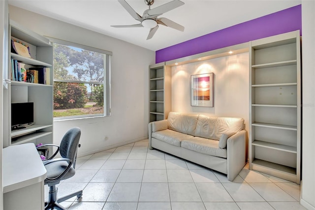 office area with ceiling fan and light tile patterned floors