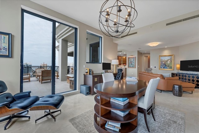 dining space with a notable chandelier