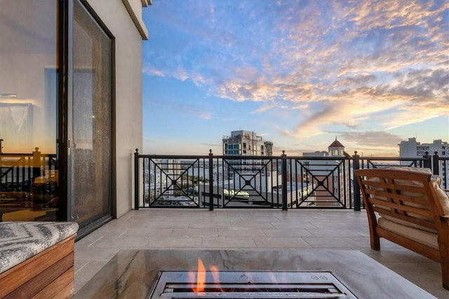 view of patio terrace at dusk