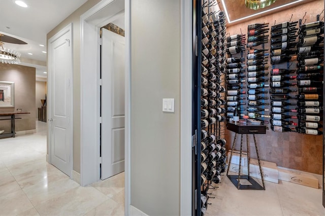 wine cellar with electric panel and light tile patterned floors