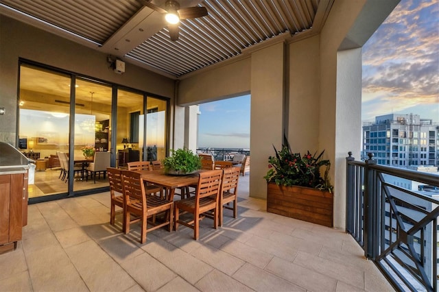 balcony at dusk with ceiling fan