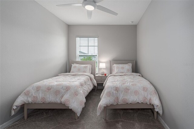 carpeted bedroom featuring a ceiling fan