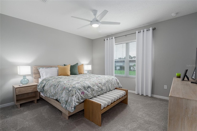 bedroom with baseboards, carpet flooring, and a ceiling fan