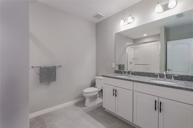 bathroom with toilet, an enclosed shower, vanity, and tile patterned flooring