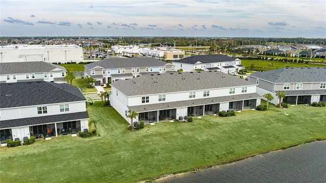 bird's eye view with a water view