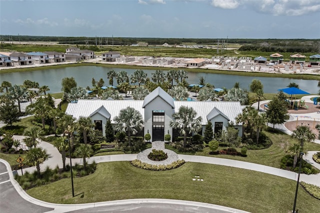 drone / aerial view with a water view