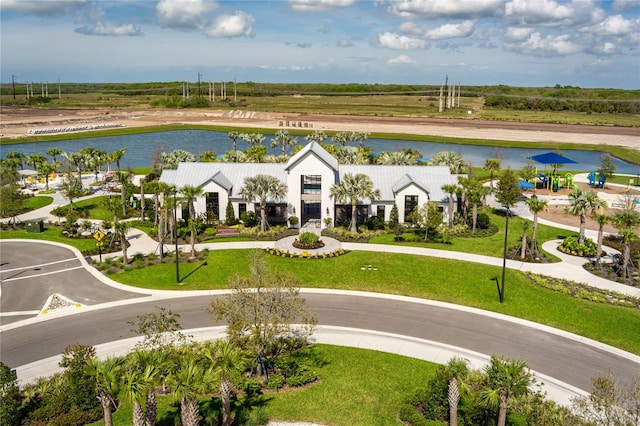 drone / aerial view with a water view