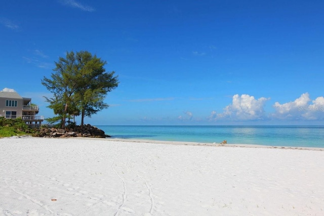 property view of water featuring a view of the beach