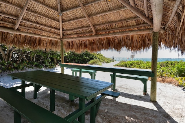 view of patio with a water view