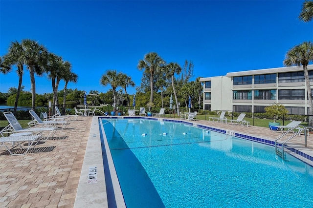 view of swimming pool featuring a patio