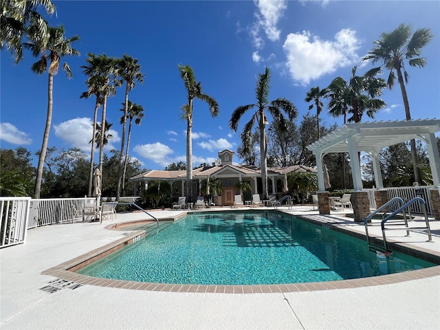 view of pool with a patio area and a pergola