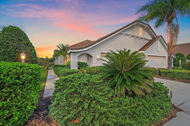 view of front of property featuring a garage