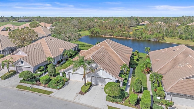 7011 Woodmore Ter, Lakewood Ranch, FL 34202 - birds eye view of property with a water view and a residential view