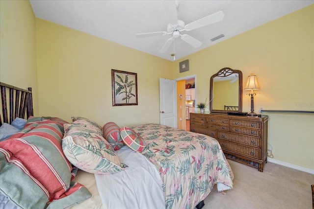 carpeted bedroom with ceiling fan