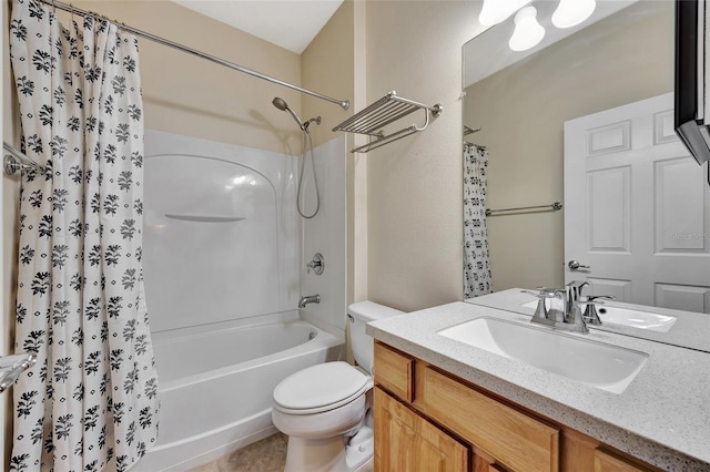 full bathroom featuring tile patterned floors, vanity, toilet, and shower / tub combo