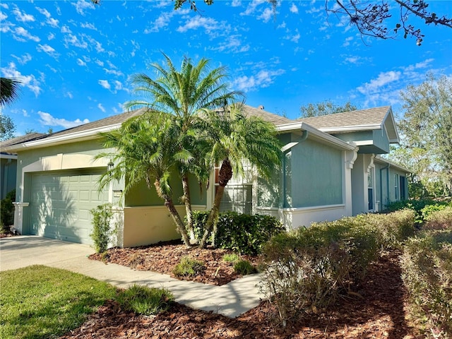 view of property exterior with a garage