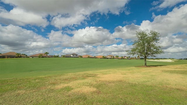 surrounding community with a lawn