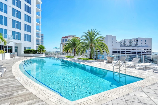 view of swimming pool with a patio