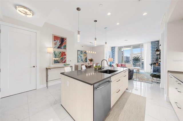 kitchen with sink, white cabinetry, hanging light fixtures, a center island with sink, and stainless steel dishwasher