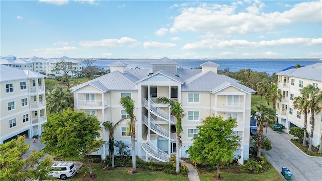 view of building exterior with a water view