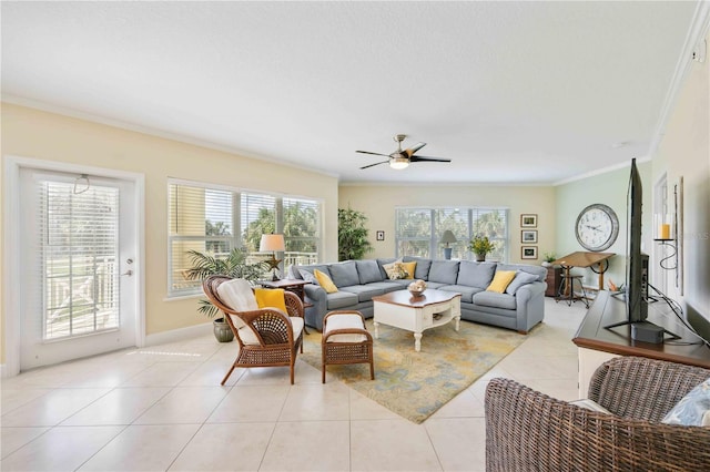 tiled living room featuring crown molding and ceiling fan