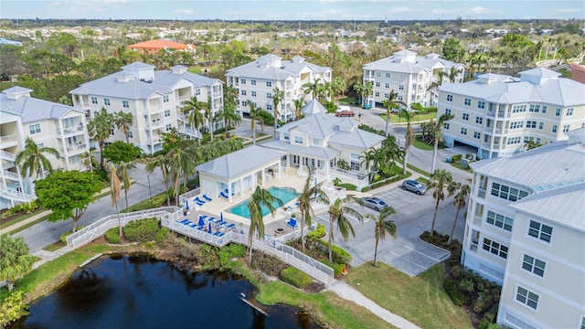 birds eye view of property with a water view