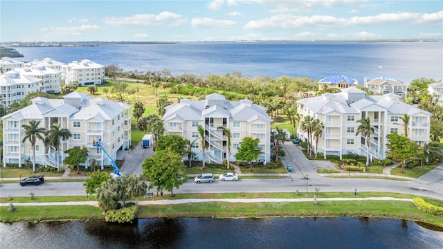 bird's eye view with a water view