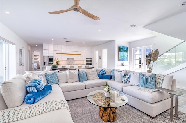 living room with ceiling fan