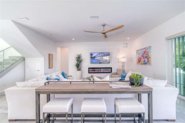 living room with ceiling fan