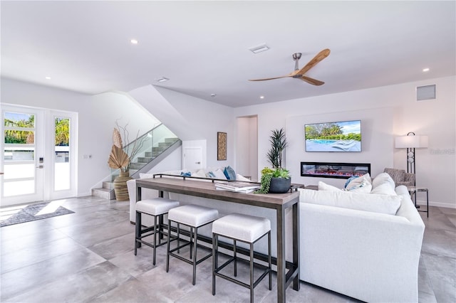 living room with ceiling fan