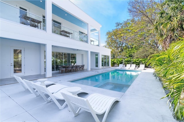 view of pool with a patio area