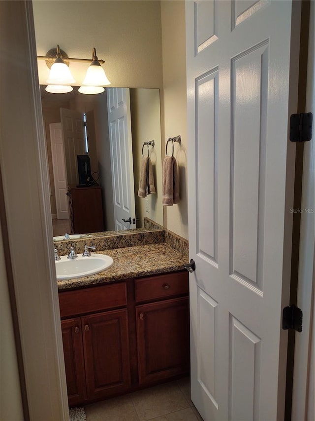 bathroom featuring vanity and tile patterned floors