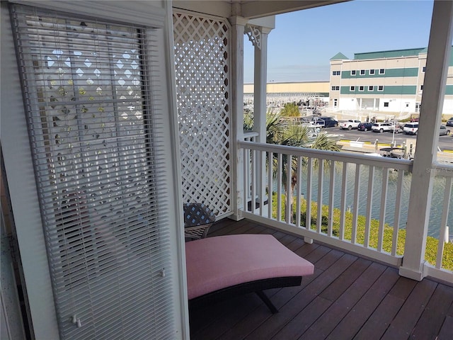 balcony featuring a water view