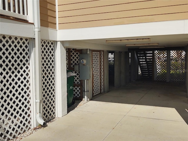 exterior space with a carport