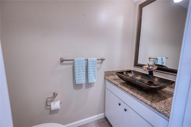 bathroom with vanity and tile patterned flooring