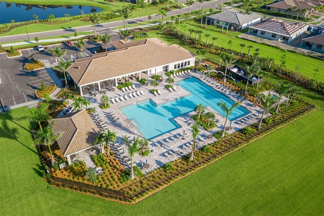 birds eye view of property featuring a water view