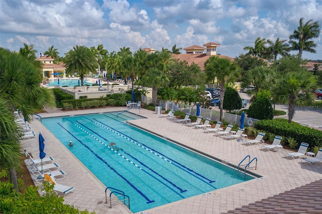 view of pool featuring a patio