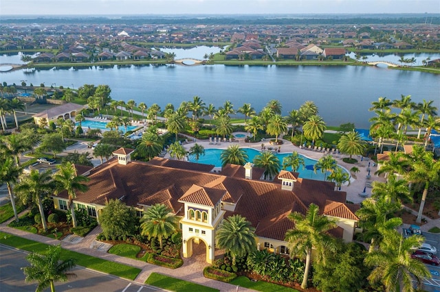 drone / aerial view with a water view