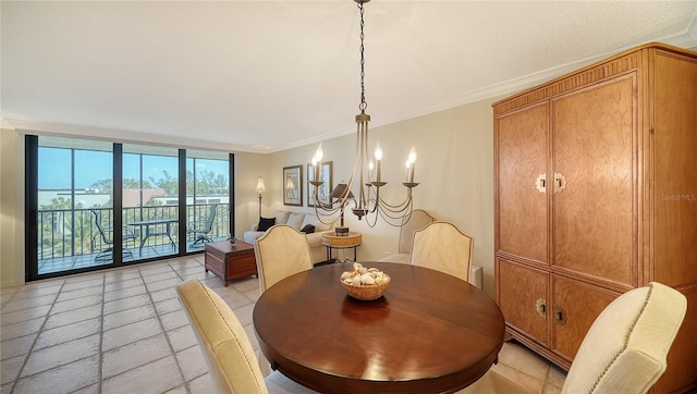 dining space with crown molding, a wall of windows, and a notable chandelier