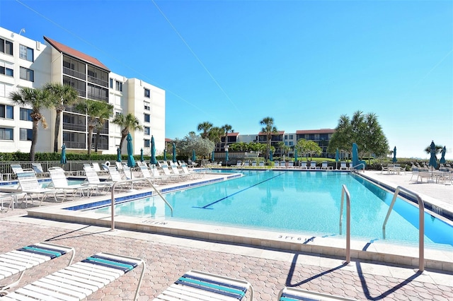 view of pool featuring a patio area